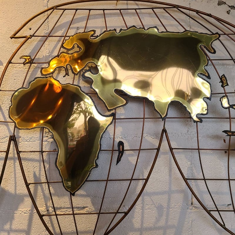 Curtis Jere wall sculpture globe | The NOON