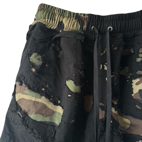 DISTRESSED CAMO SHORTS