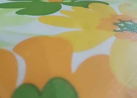 お花柄のビニール編み収納ケース