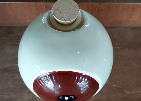 陶器の目玉のおやじ✩.*˚酒瓶