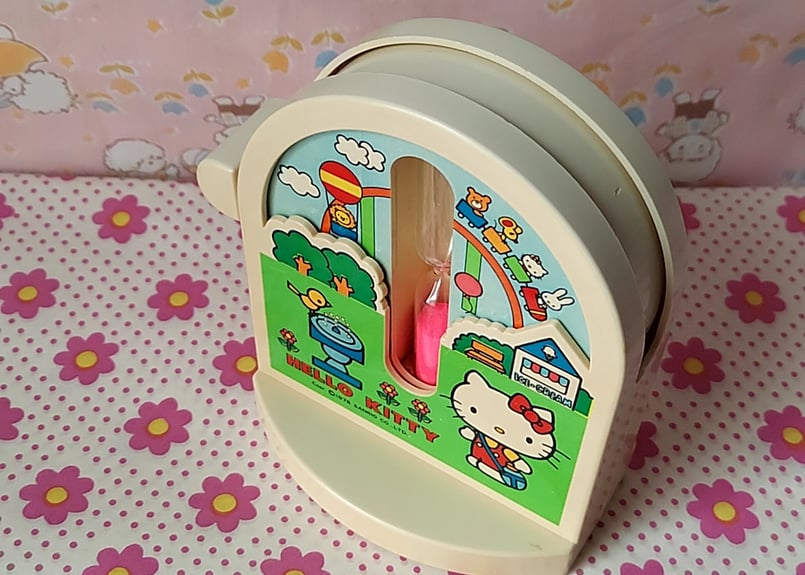 未使用　ハローキティ 　ゼンマイ式回転ドーム　ドリンクボトル　トロピカル　レトロ 1976年・キティちゃんの回転砂時計 | あんちーくKIDAN STORE