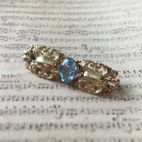 アクアブルーのグラスストーンのヴィンテージブローチ/ドイツ