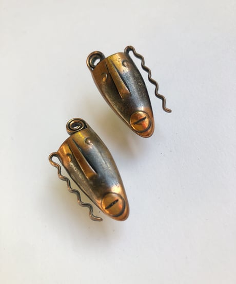 rabajes copper face earrings