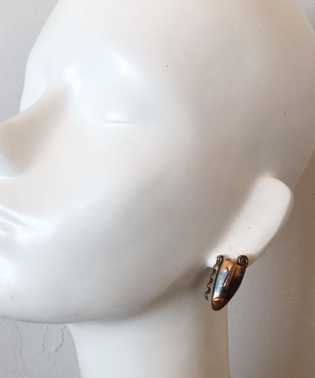 rabajes copper face earrings