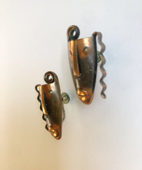rabajes copper face earrings