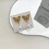 yellow butterfly soap bubble