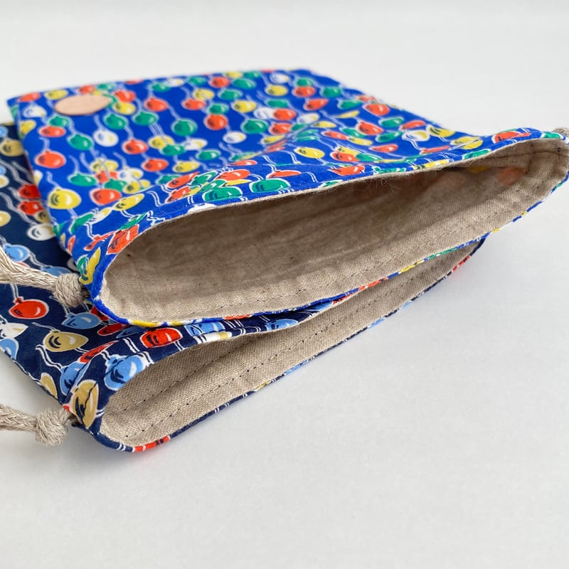 Number_i GOD_i 3形態　ステッカー付き　リップバーム、巾着 Number_i GOD_i 3形態 ステッカー付き リップバーム、巾着