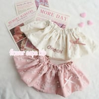 flower cape bib