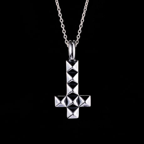 Anti studs cross charm