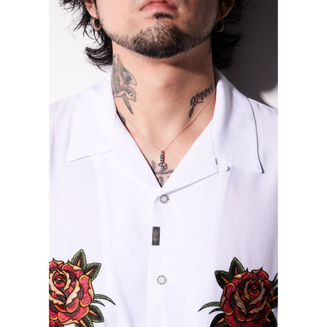 Anti studs cross charm