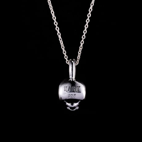 Half skull charm