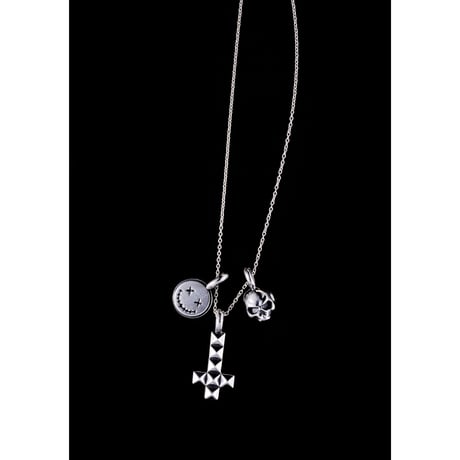 Half skull charm