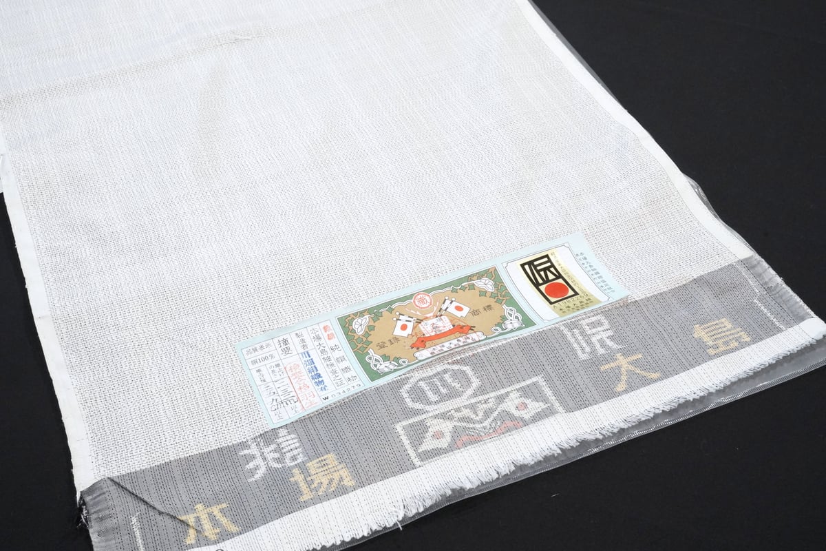本場大島紬「白大島・川畑絹織物・よろけ織絣」 | MINOKO STORE