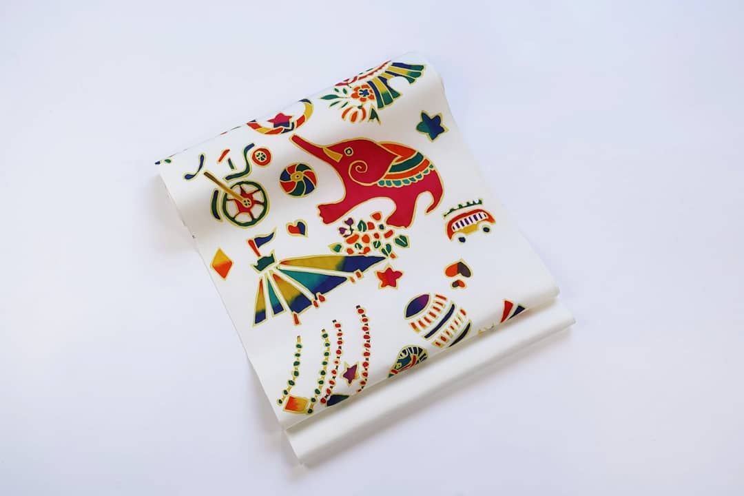 九寸帯(名古屋帯)「岡重・紬帯地使用・サーカス」 | MINOKO STORE 九寸帯(名古屋帯)「岡重・紬帯地使用・サーカス」 | MINOKO STORE