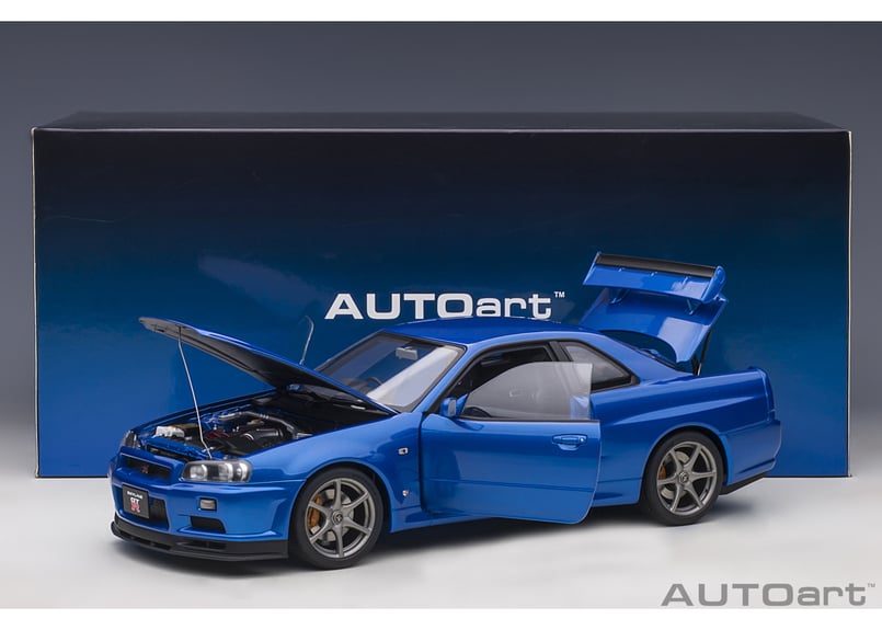 オートアート ニッサンスカイラインGT-R R34VスペックIIベイサイドブルー素材金属