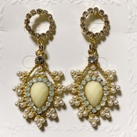 ホースアイロココピアス