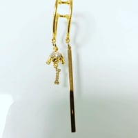 垂れ耳犬のイヤーカフ