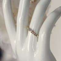 淡いイエローバゲット0.132ct・ブラウンメレ0.08ct　ダイヤモンドリング　K18WG