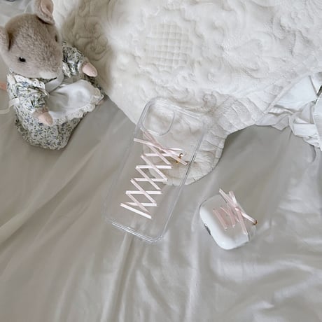 Lace up ribbon case