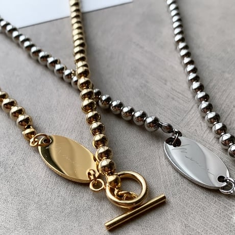 gold metal ball necklace