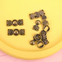 チャイナボタン0.6×1.5cm（アンティークゴールド）