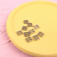 金属バックル6ｍｍ（シルバー）