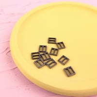 金属バックル6ｍｍ（アンティークシルバー）