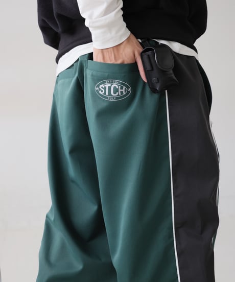 【ANTIQUAGOLF×STCH】 color matching pants-green