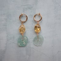 roman glass × citrin − E222