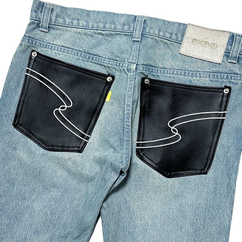 LEATHER SLID DENIM PANTS / INDIGO | SKINS ONLIN