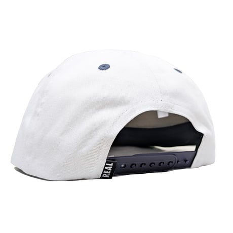 REAL SKATEBOARDS キャップ CAP リアル スケートボード ホワイトｘネイビー　REAL ADJ SFC SNAPBACK CAP （WHITE/NAVY）