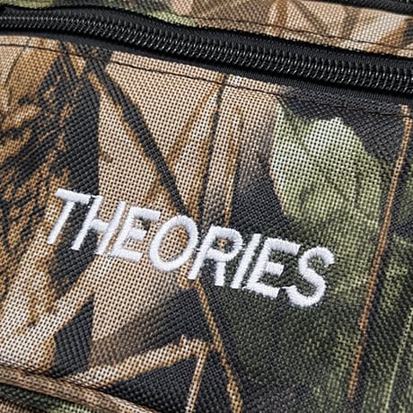THEORIES バッグ　THEORIES SHOULDER BAG STAMP DAY PACK (REAL-TREE.CAMO)