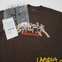 新品 XL トラヴィススコット CACTUS JACK UTOPIA Tシャツ こげ茶 ダーク ブラウン メンズ