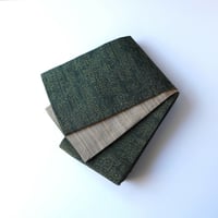 紬半幅帯  千歳緑地に風景文様 × 丁子色地に縞文様