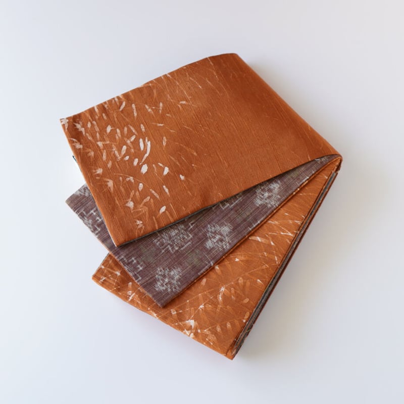 紬半幅帯 パッチワーク×橙色紬地に手描き芝草模様 | 古今堂 ふだん着物屋