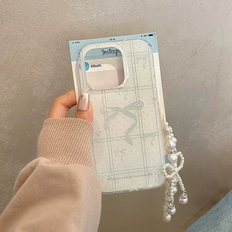 【お取り寄せ商品】iPhoneケース スマホケース iPhone15 iPhone16 選べるストラップ付き リボン ホワイト ガーリー L8373