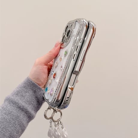 【お取り寄せ商品】iPhoneケース スマホケース iPhone16 iPhone15 iPhone14 かわいい ストーン 韓国 おしゃれ ハンドストラップ付き ウェーブ L9375