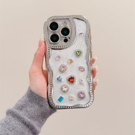【お取り寄せ商品】iPhoneケース スマホケース iPhone16 iPhone15 iPhone14 かわいい ストーン 韓国 おしゃれ ハンドストラップ付き ウェーブ L9375
