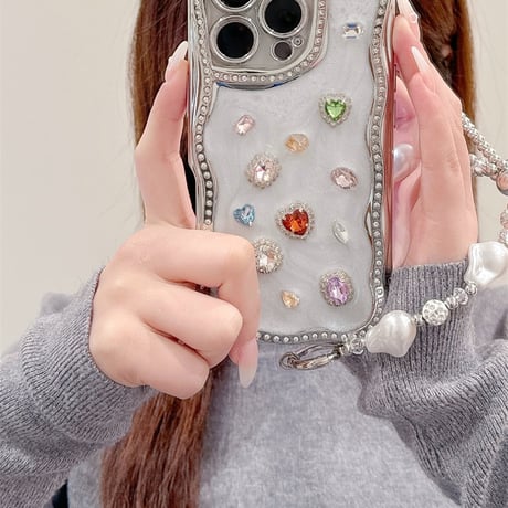 【お取り寄せ商品】iPhoneケース スマホケース iPhone16 iPhone15 iPhone14 かわいい ストーン 韓国 おしゃれ ハンドストラップ付き ウェーブ L9375