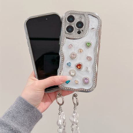 【お取り寄せ商品】iPhoneケース スマホケース iPhone16 iPhone15 iPhone14 かわいい ストーン 韓国 おしゃれ ハンドストラップ付き ウェーブ L9375