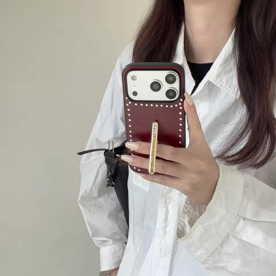 K23102 スタッズデザインスタンドiPhoneケース | nanomita