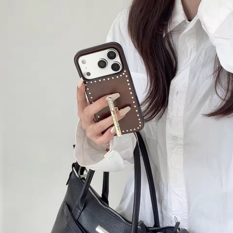 K23102 スタッズデザインスタンドiPhoneケース | nanomita