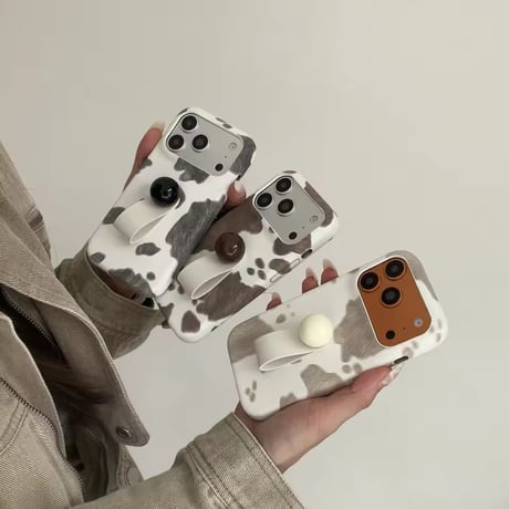 K23002 ニュアンスカウ柄 フィンガーストラップ＆スタンド iPhoneケース