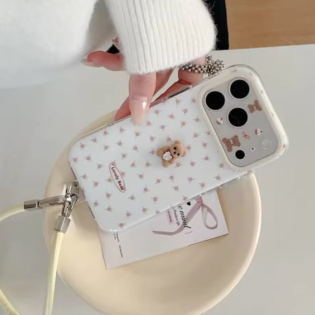 K23049 くすみフラワーベアiPhoneケース（ハンドストラップ付き）
