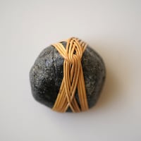 WRAPPED ROCKS M SZ282