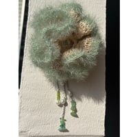 Fluffy green scrunchie