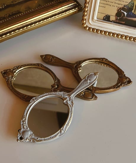 decorative wall hand mirror