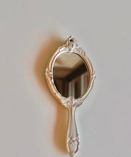 decorative wall hand mirror