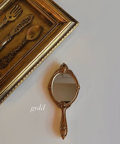 decorative wall hand mirror