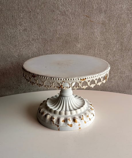 shabby iron stand